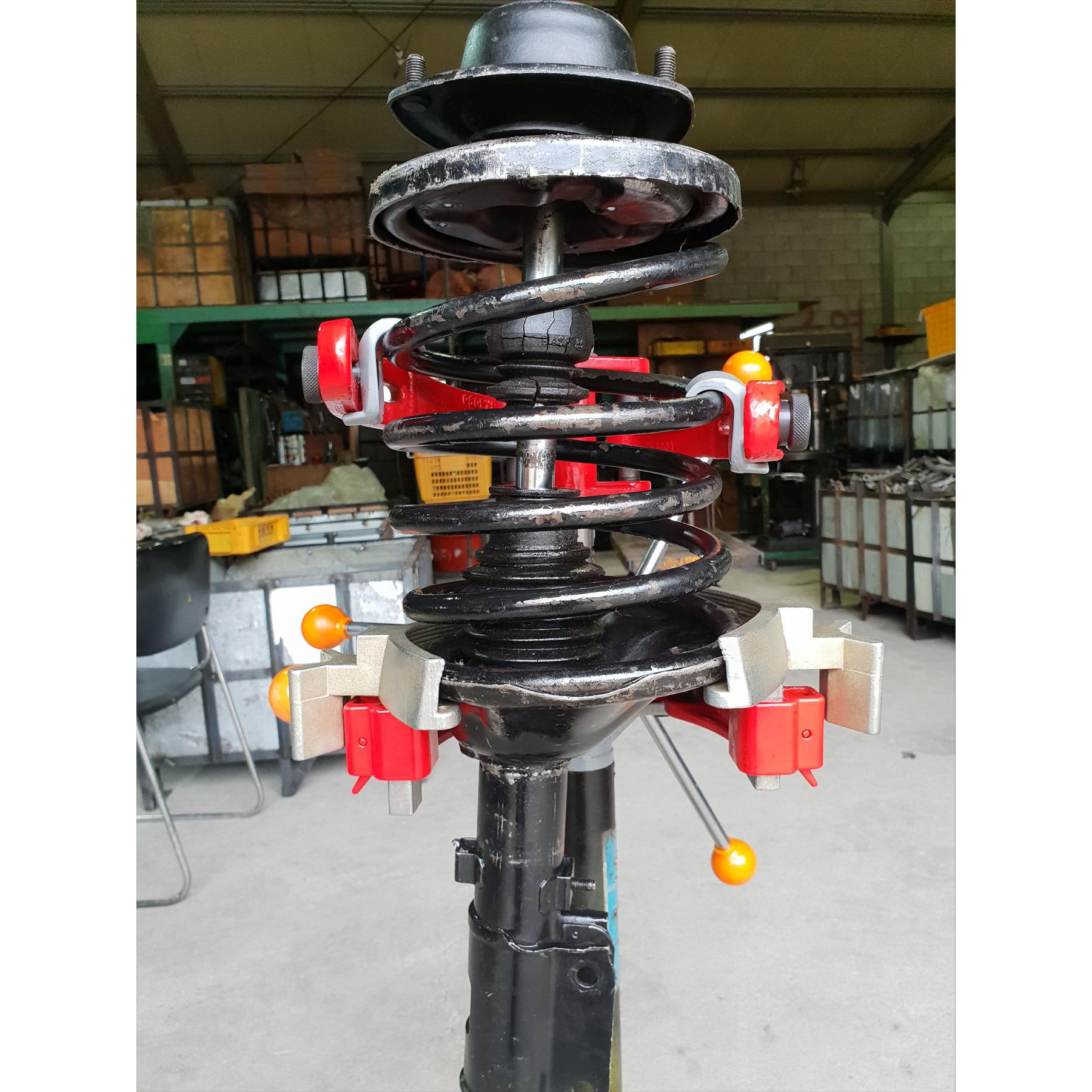 how to compress strut spring at home