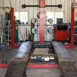 a picture of a 4 post car lift on a garage