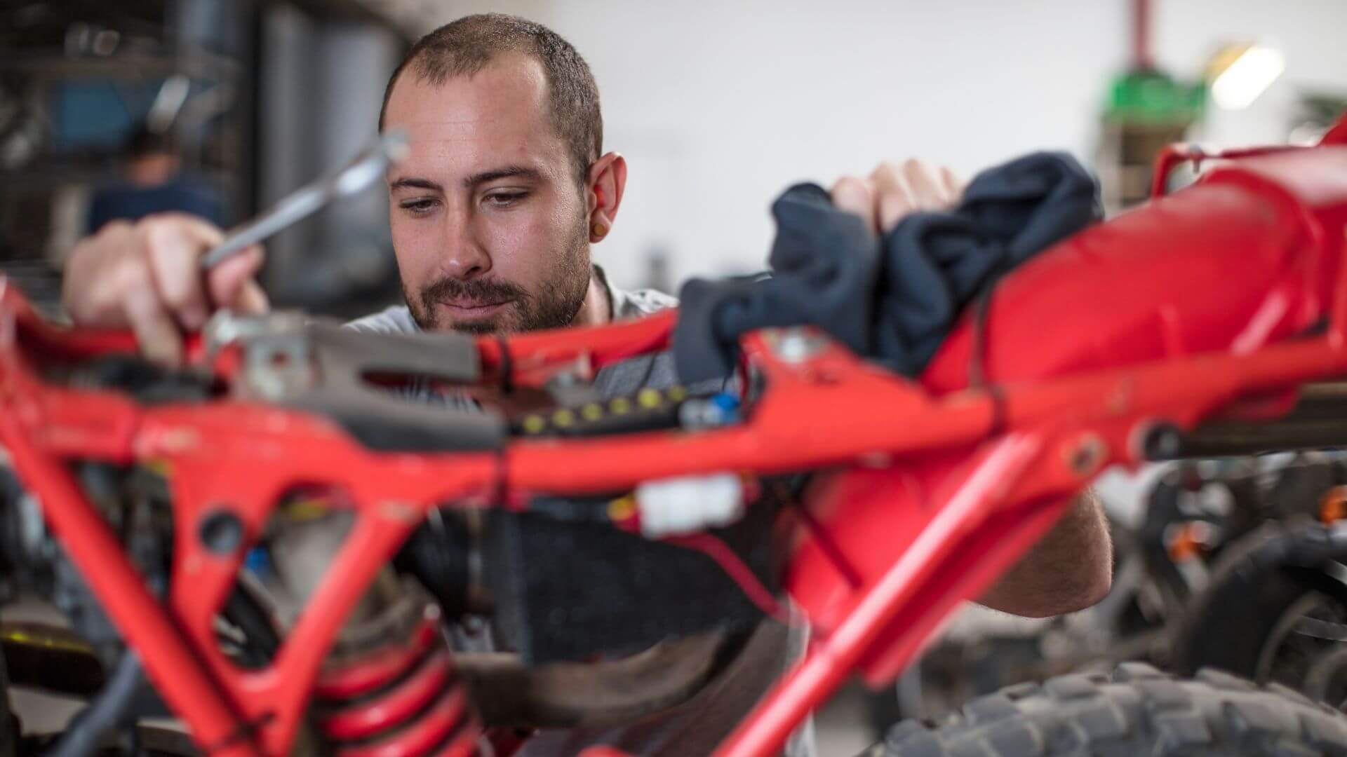 Machanic working on dirt bike