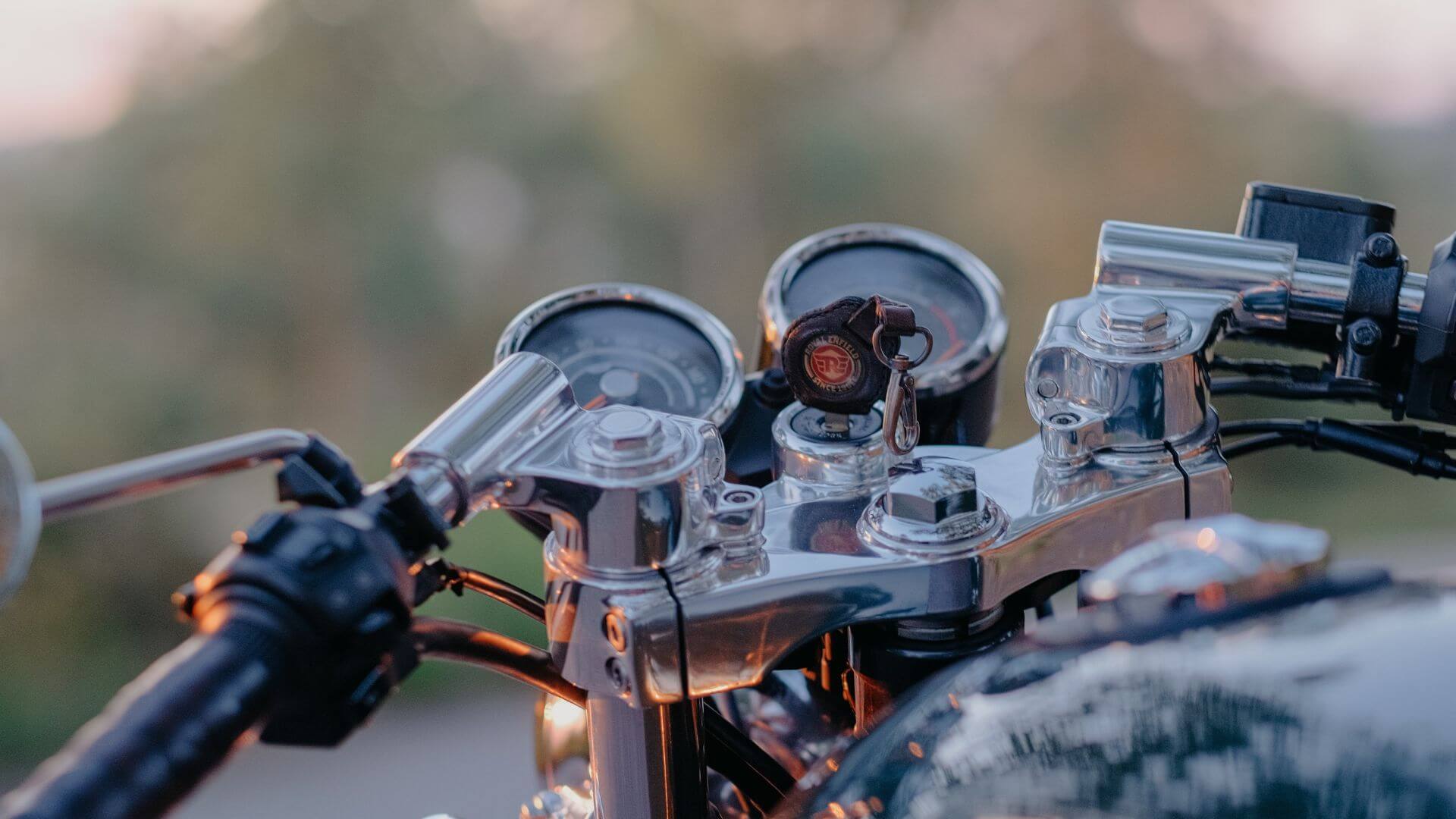 the front view from a motorcycle on a sunset